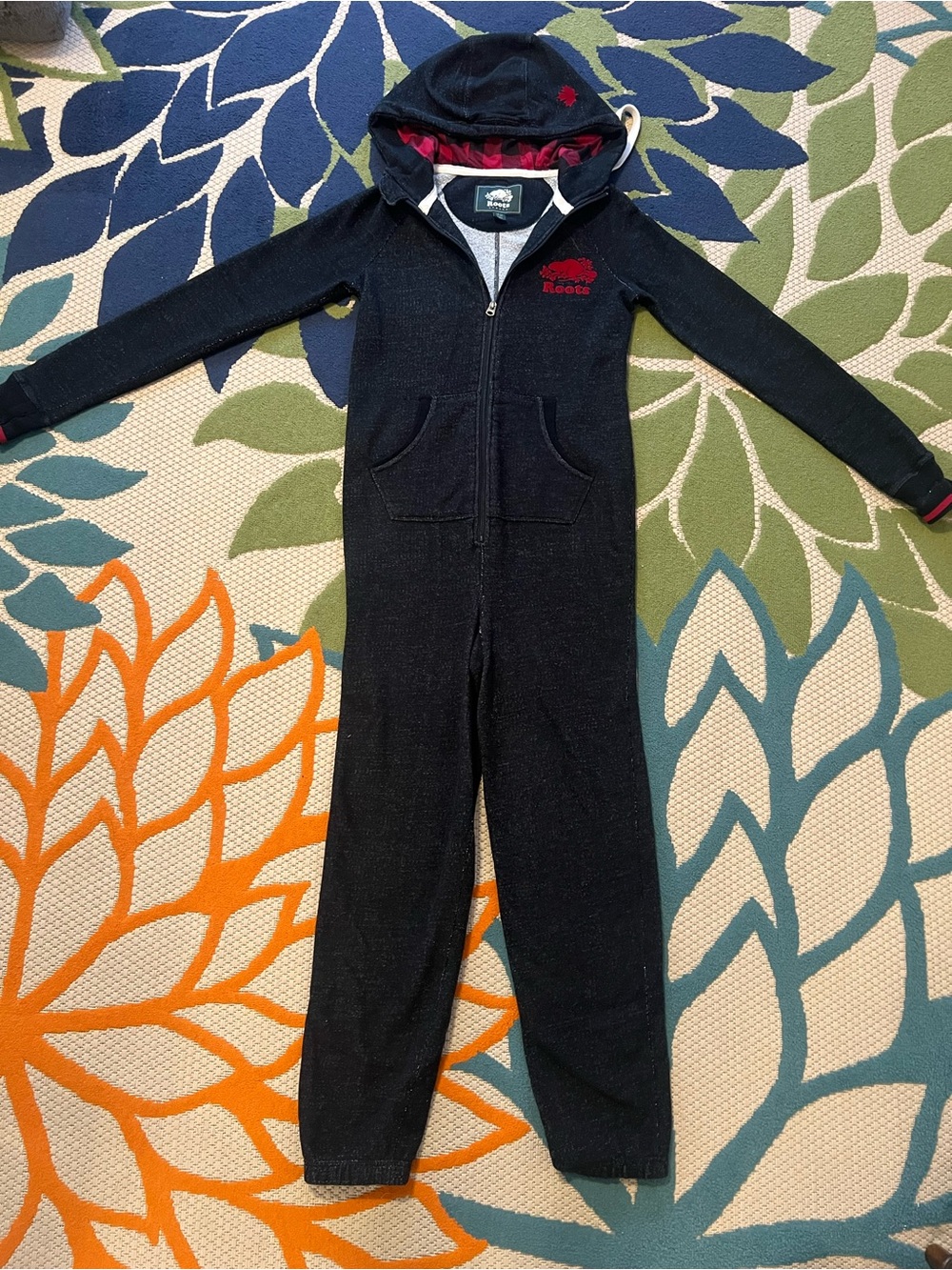 Women’s Roots Black Hooded Onsie Jumpsuit with Red Accent Logo